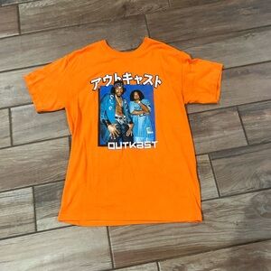 Orange outcast tee shirt